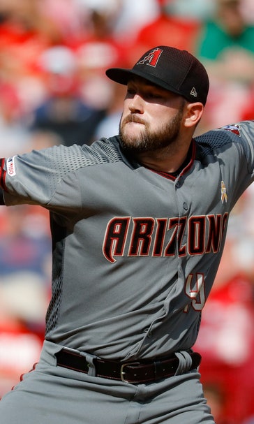 Young, Marte, surging Dbacks top Reds 2-0 for 5th win in row